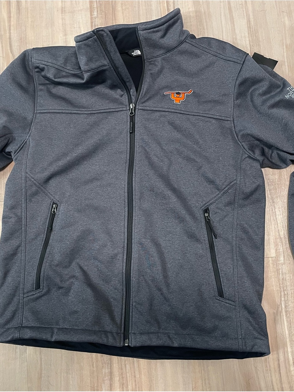 The North Face Men's Dark Gray Lightweight Softshell Jacket with Orange Logo